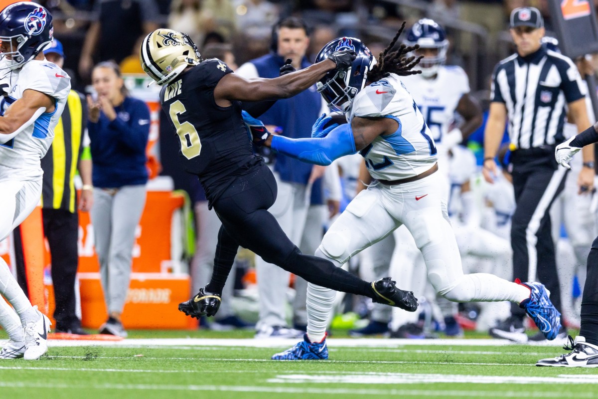 Derrick Henry (22) rushes against New Orleans Saints safety Marcus Maye (6) at the Caesars Superdome.   