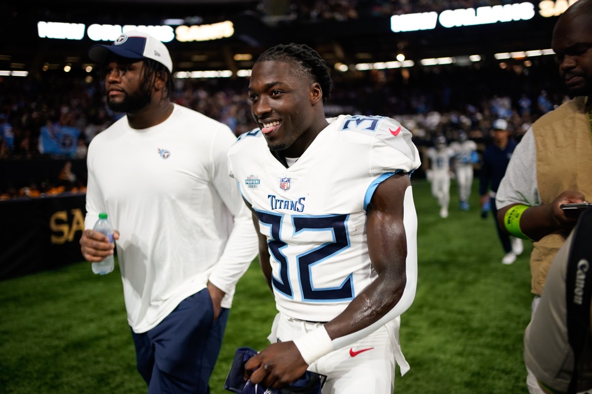 Tennessee Titans running back Tyjae Spears (32) takes the field as the team gets ready to face the New Orleans Saints at Caesars Superdome.