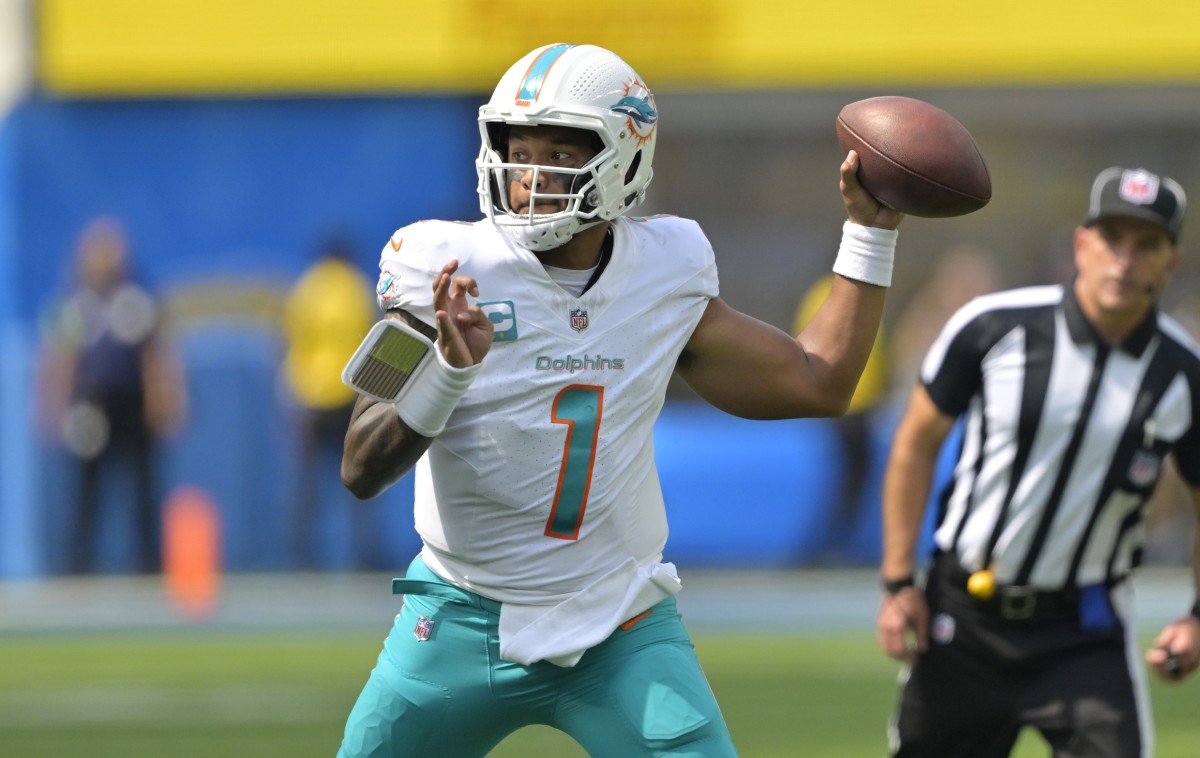 Dolphins quarterback Tua Tagovailoa passes for 466 yards and three touchdowns in Miami's 36-34 win over the Chargers in Week 1 of the NFL schedule.