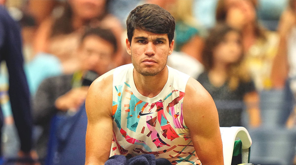 Carlos Alcaraz takes a break during U.S. Open play.