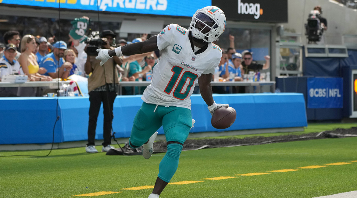 Dolphins wide receiver Tyreek Hill leads the NFL with 215 receiving yards after Week 1.