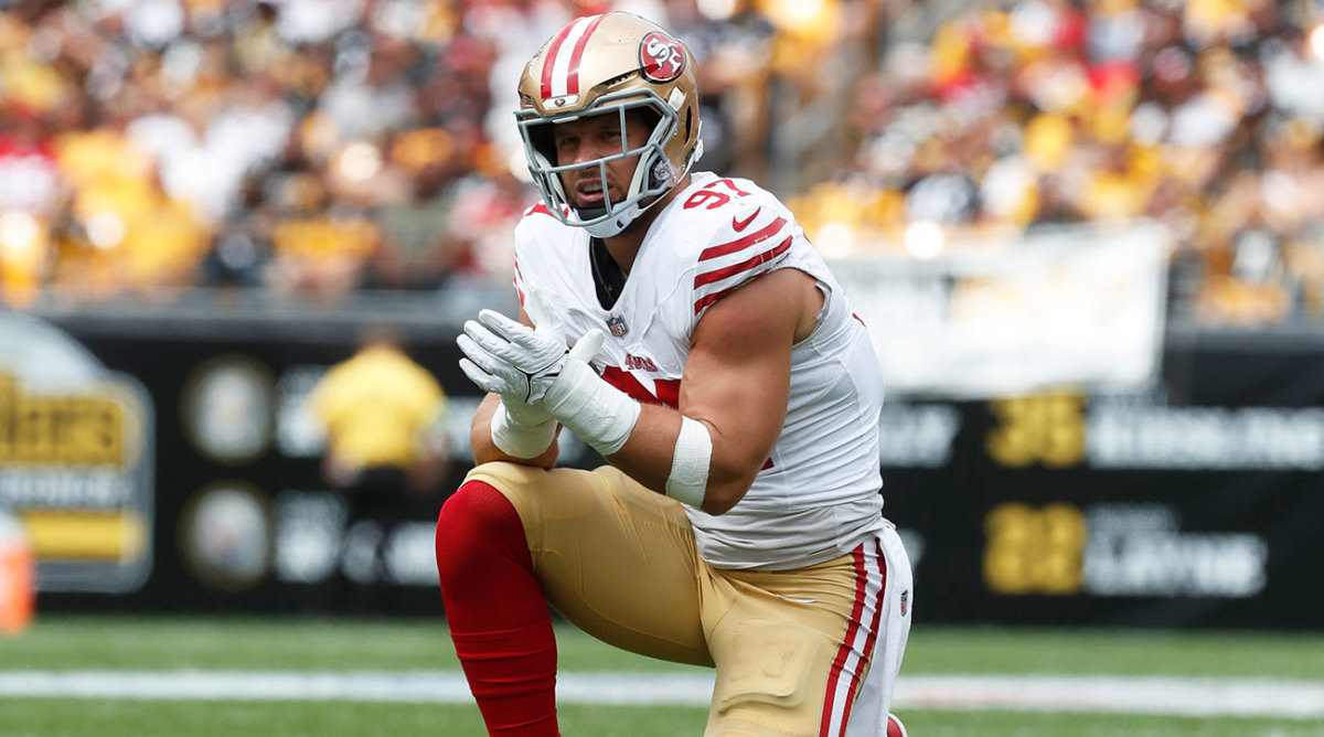 Nick Bosa kneels during the 49ers’ Week 1 game against the Steelers