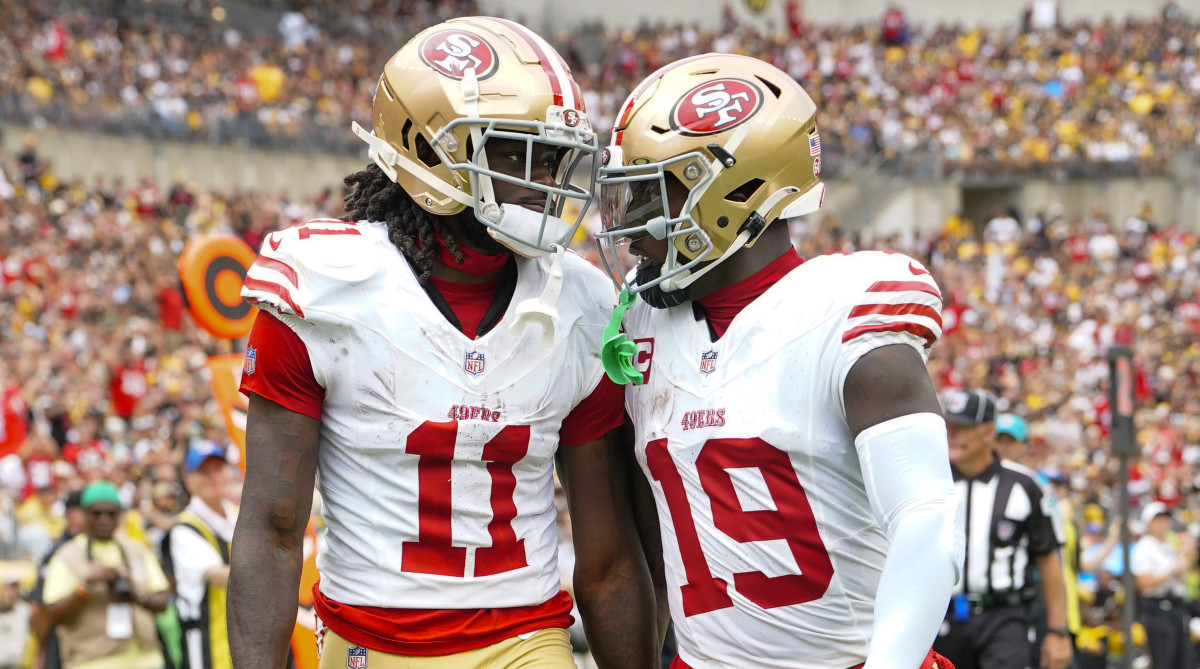 49ers wide receiver Deebo Samuel, right, congratulates teammate Brandon Aiyuk for catching a touchdown in Week 1 win over Steelers