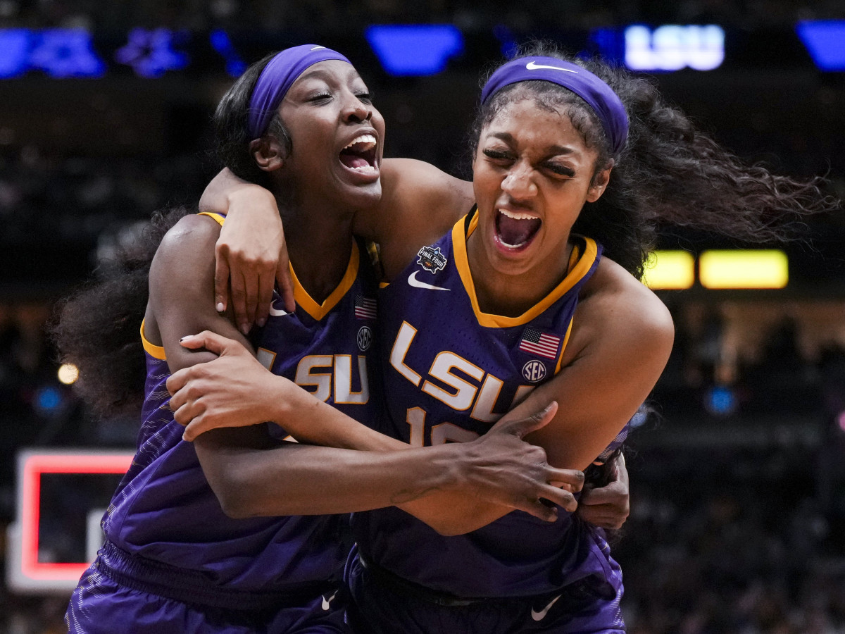 LSU guard Flau'jae Johnson celebrates with forward Angel Reese after defeating Virginia Tech in the Women's Final Four of the 2023 NCAA Tournament.