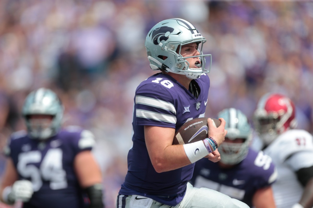 Kansas State senior quarterback Will Howard (18) runs in for a touchdown in the third quarter of Saturday's game against Troy inside Bill Snyder Family Stadium.