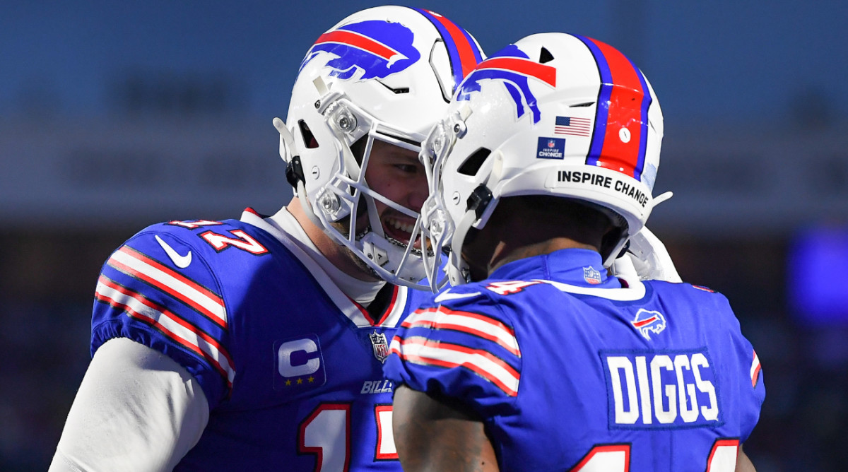 Bills quarterback Josh Allen and receiver Stefon Diggs celebrate a catch.