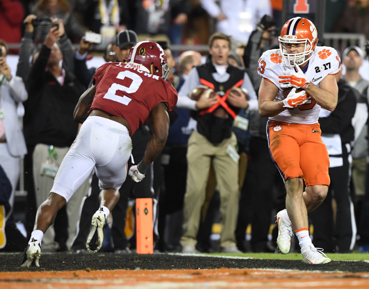 Clemson Tigers wide receiver Hunter Renfrow (13) catches the winning touchdown against Alabama Crimson Tide defensive back Tony Brown (2) in the fourth quarter in the 207 College Football Playoff National Championship Game at Raymond James Stadium.