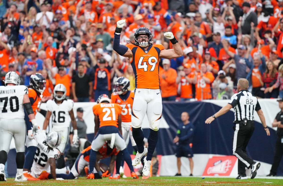 Denver Broncos linebacker Alex Singleton (49) reacts to his turnover in the third quarter against the Las Vegas Raiders at Empower Field at Mile High.
