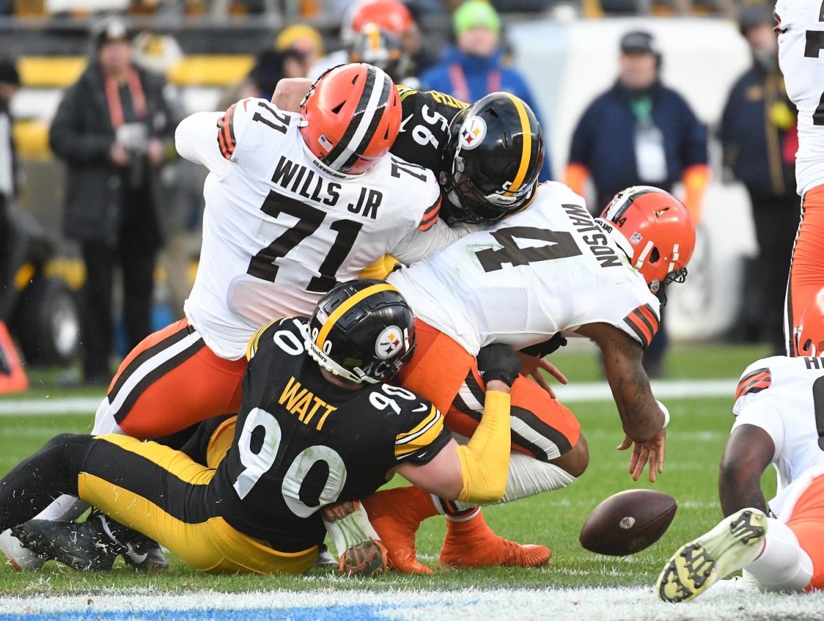 Jan 8, 2023; Pittsburgh, Pennsylvania, USA; Cleveland Browns quarterback Deshaun Watson (4) is pressured by Pittsburgh Steelers linebackers T.J. Watt (90) and Alex Highsmith (56) during the fourth quarter at Acrisure Stadium. Mandatory Credit: Philip G. Pavely-USA TODAY Sports