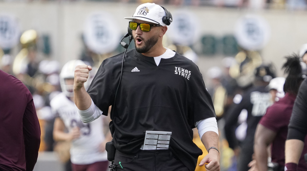 Texas State coach G.J. Kinne reacts after a touchdown against Baylor.