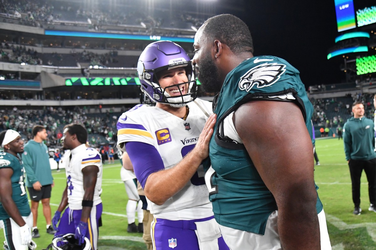 Sep 14, 2023; Philadelphia, Pennsylvania, USA; Minnesota Vikings quarterback Kirk Cousins (8) and Philadelphia Eagles defensive tackle Fletcher Cox (91) meet on the field after game at Lincoln Financial Field. Credit: Eric Hartline-USA TODAY Sports