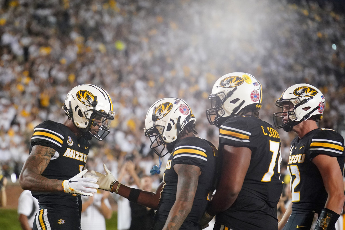 Missouri Tigers wide receiver Theo Wease Jr. (1) celebrates with wide receiver Luther Burden III (3) after Wease s touchdown against the Middle Tennessee Blue Raiders during the second half at Faurot Field at Memorial Stadium. 