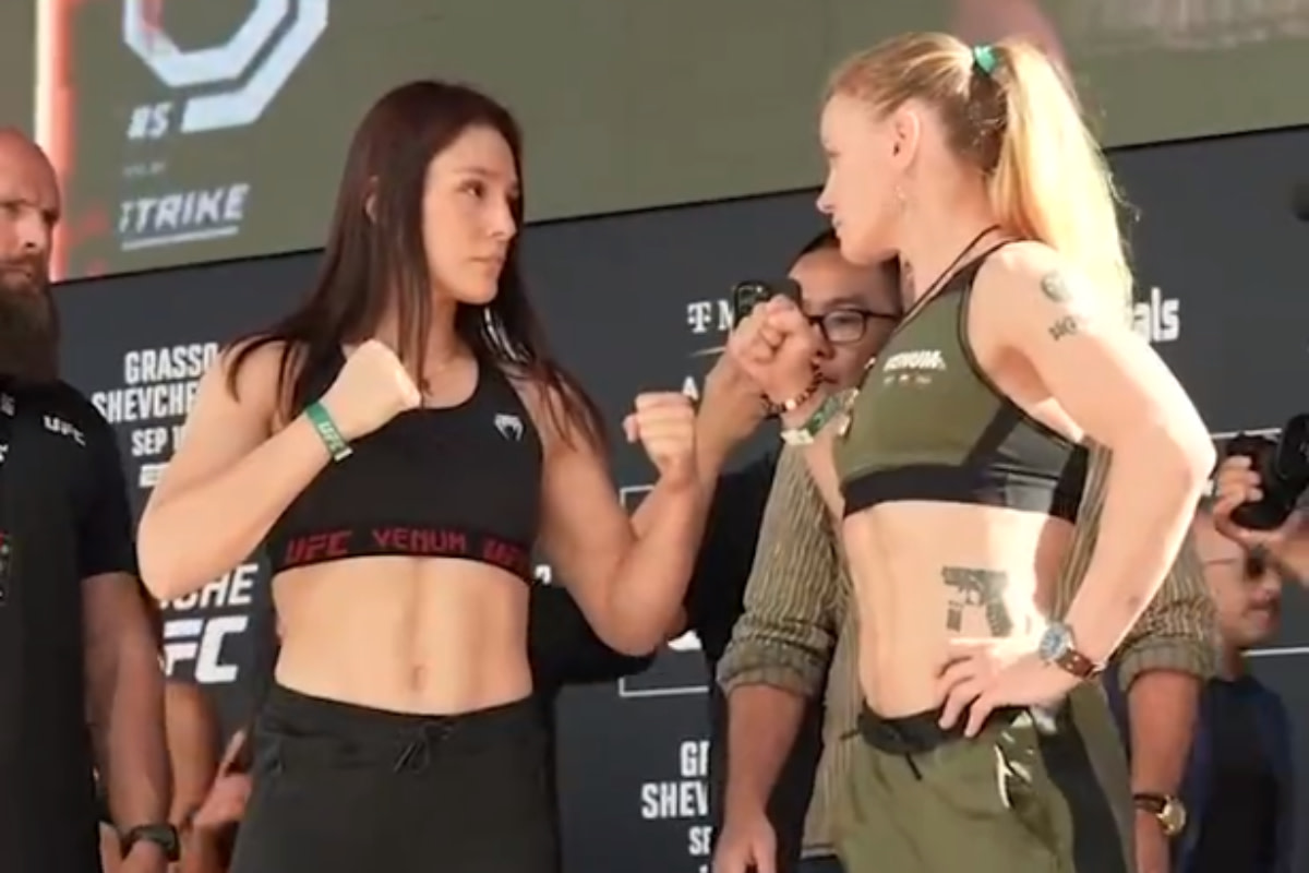 Alexa Grasso and Valentina Shevchenko stare down during the Noche UFC ceremonial weigh-ins.