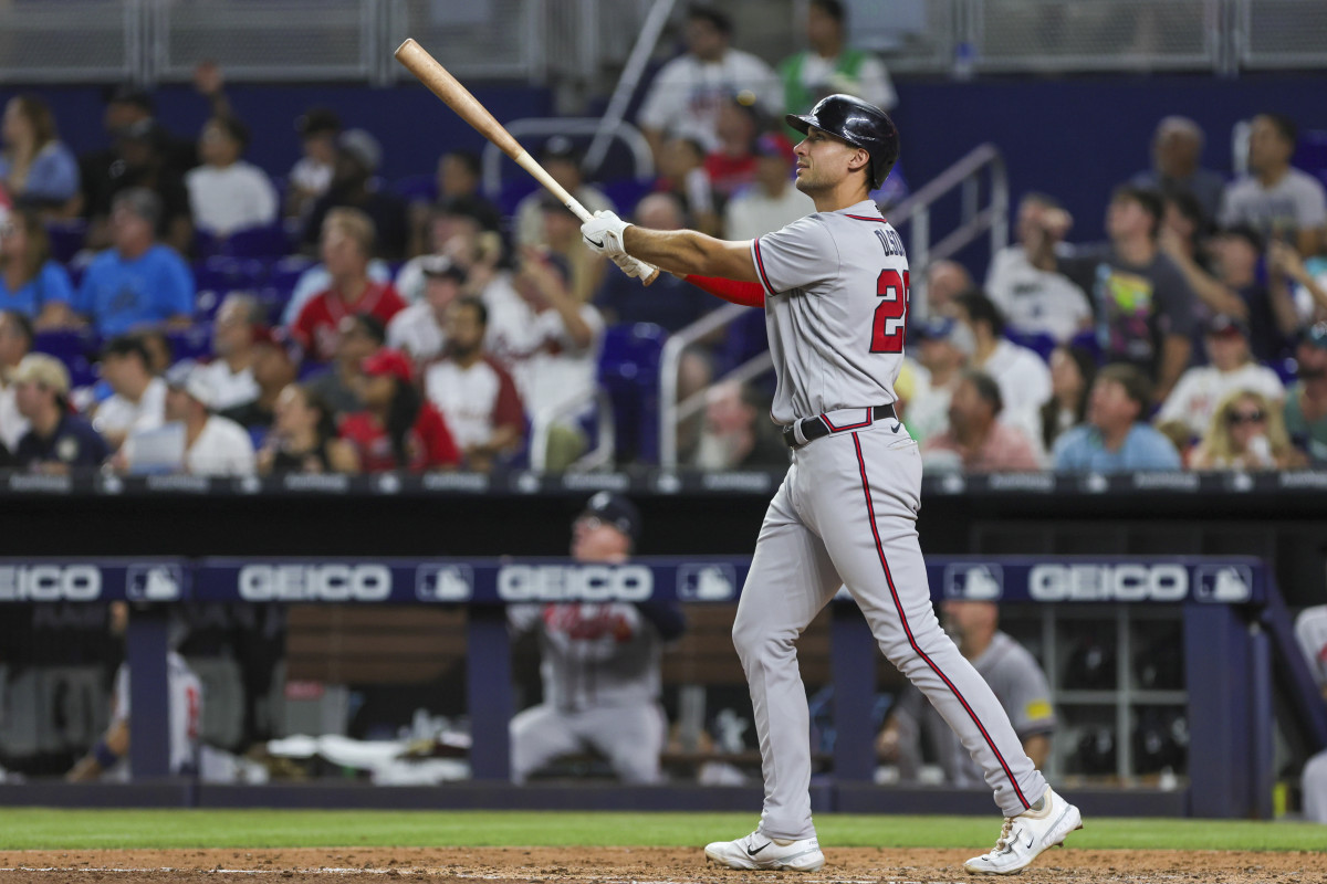 Sep 16, 2023; Miami, Florida, USA; Atlanta Braves first baseman Matt Olson (28) hits a home run against the Miami Marlins during the sixth inning at loanDepot Park.