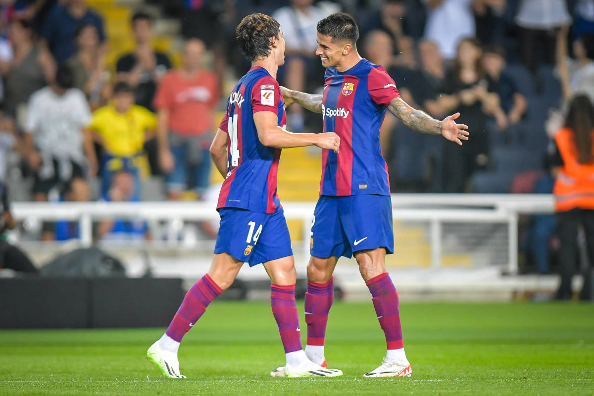 Joao Felix (left) and Joao Cancelo pictured celebrating during Barcelona's 5-0 win over Real Betis in September 2023