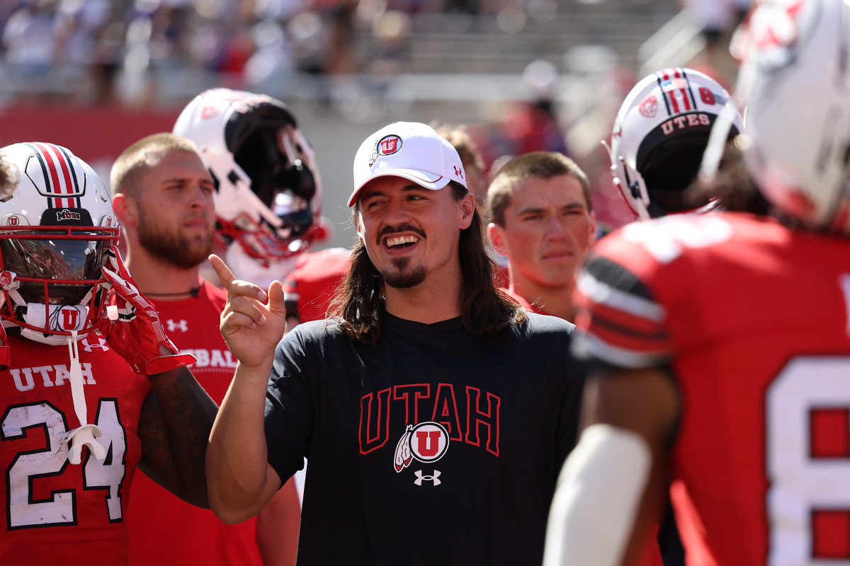 Sep 16, 2023; Salt Lake City, Utah, USA; Utah Utes quarterback Cameron Rising (7) celebrates with teammates after defeating the Weber State Wildcats at Rice-Eccles Stadium. Mandatory Credit: Rob Gray-USA TODAY Sports