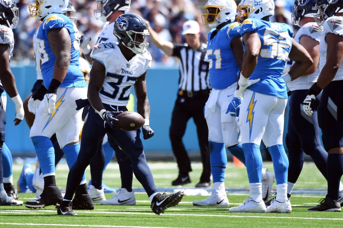 Titans running back Tyjae Spears (32) celebrates after a short gain during the first half against the Los Angeles Chargers.