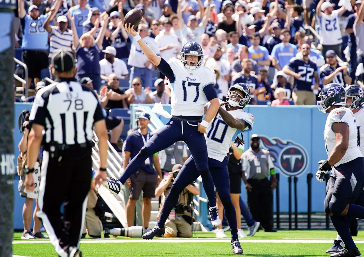 Titans quarterback Ryan Tannehill (17) celebrates his touchdown in the third quarter against the Los Angeles Chargers.