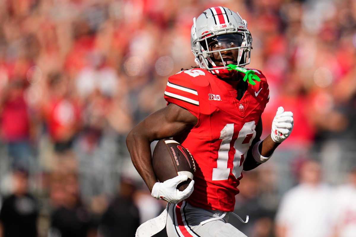 Ohio State Buckeyes wide receiver Marvin Harrison Jr. runs for a 75-yard touchdown against Western Kentucky.