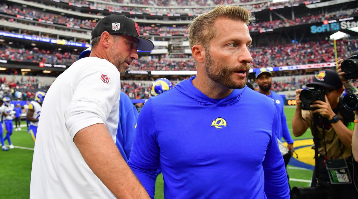 Kyle Shanahan walks past Sean McVay