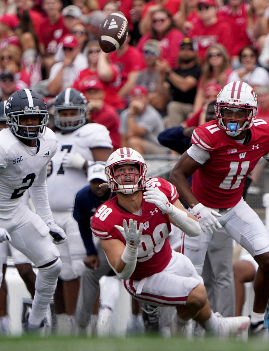 Sep 16, 2023; Madison, Wisconsin, USA; Wisconsin Badgers linebacker C.J. Goetz (98) intercepts a pass against the Georgia Southern Eagles during the third quarter at Camp Randall Stadium. Mandatory Credit: Mark Hoffman-USA TODAY Sports