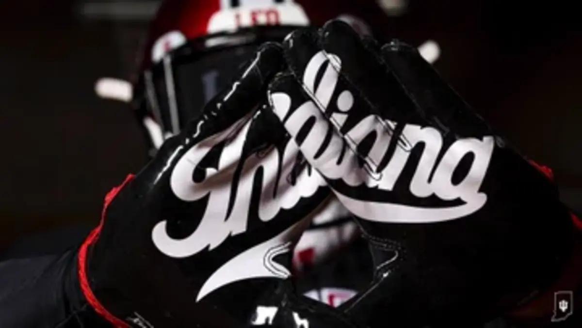 When held up together, players' gloves reveal the classic script Indiana logo.