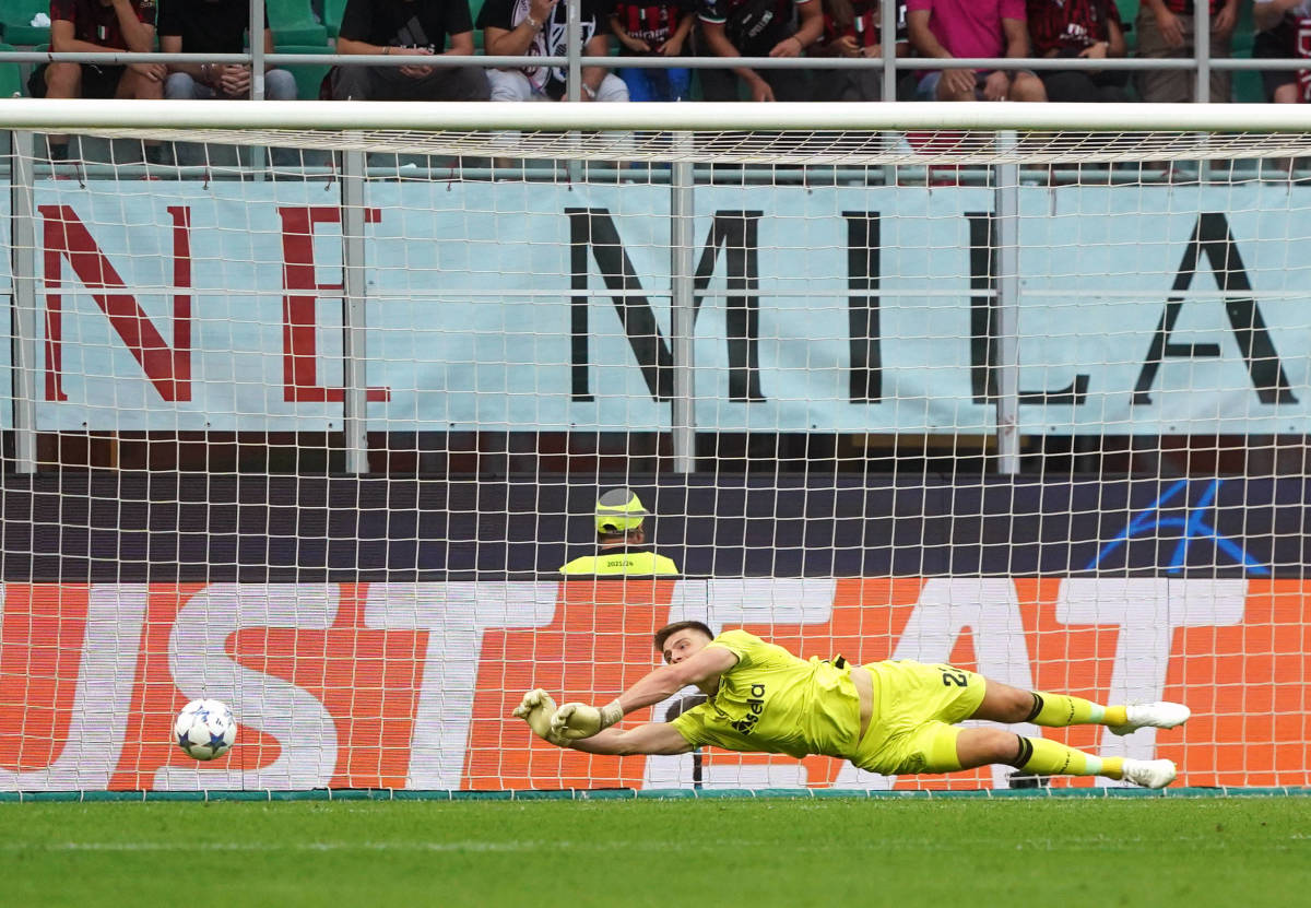 Goalkeeper Nick Pope pictured making one of EIGHT saves during Newcastle's 0-0 draw at AC Milan in the UEFA Champions League in September 2023
