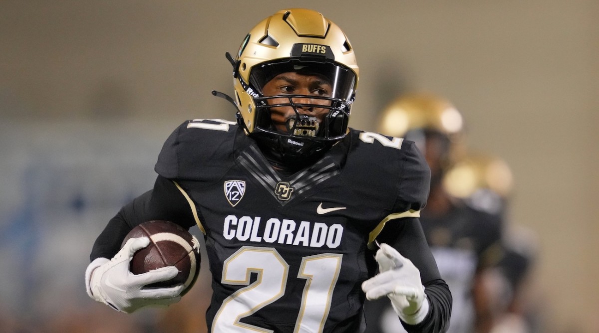 Sep 16, 2023; Boulder, Colorado, USA; Colorado Buffaloes safety Shilo Sanders (21) runs for a touchdown after making an interception against the Colorado State Rams during the first half at Folsom Field.