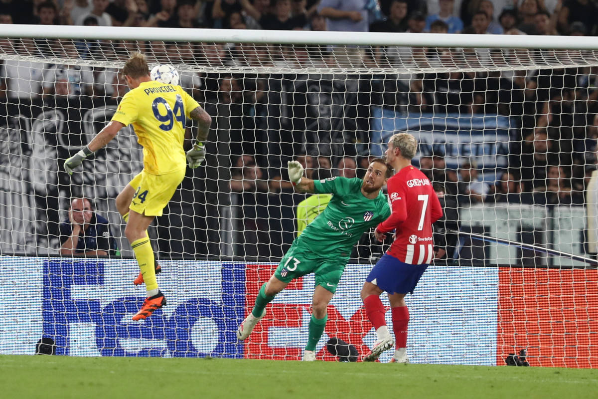 Lazio goalkeeper Ivan Provedel pictured heading the ball to score a goal against Atletico Madrid in September 2023