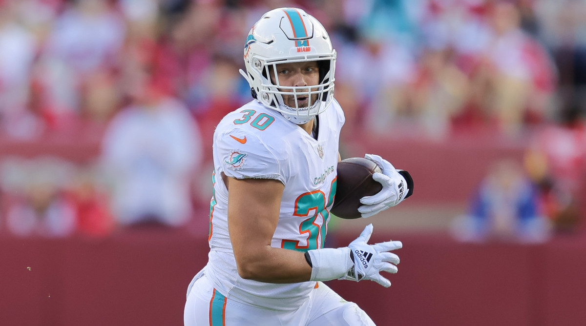 Dolphins fullback Alec Ingold runs with the ball