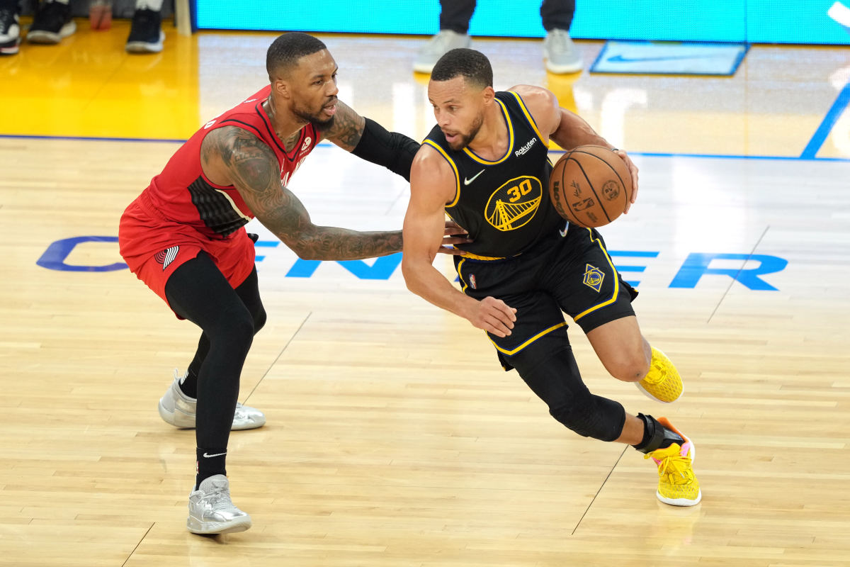 Portland Trail Blazers guard Damian Lillard and Golden State Warriors guard Stephen Curry.