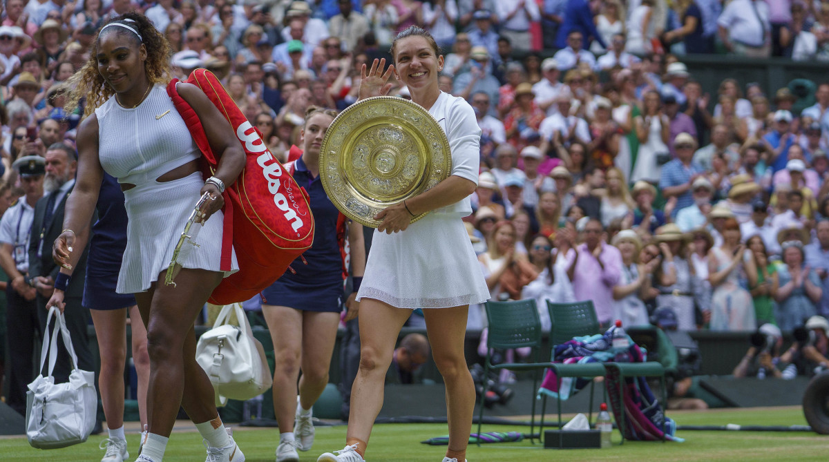 Serena Williams and Simona Halep leave the court after the Wimbledon final.
