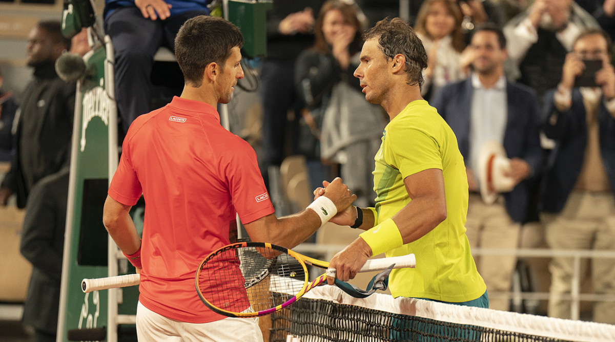 Rafael Nadal (right) at the net with Novak Djokovic (left) after their match on day 10 of the French Open.