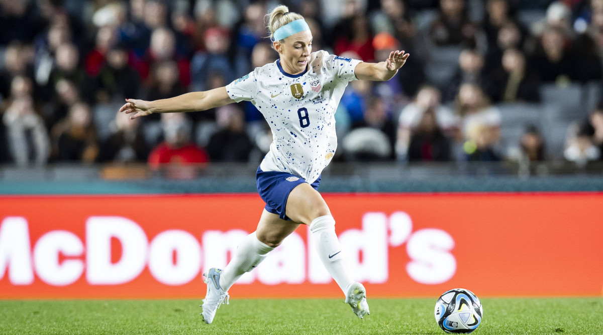 USWNT midfielder Julie Ertz passes the ball in a World Cup match against Portugal.