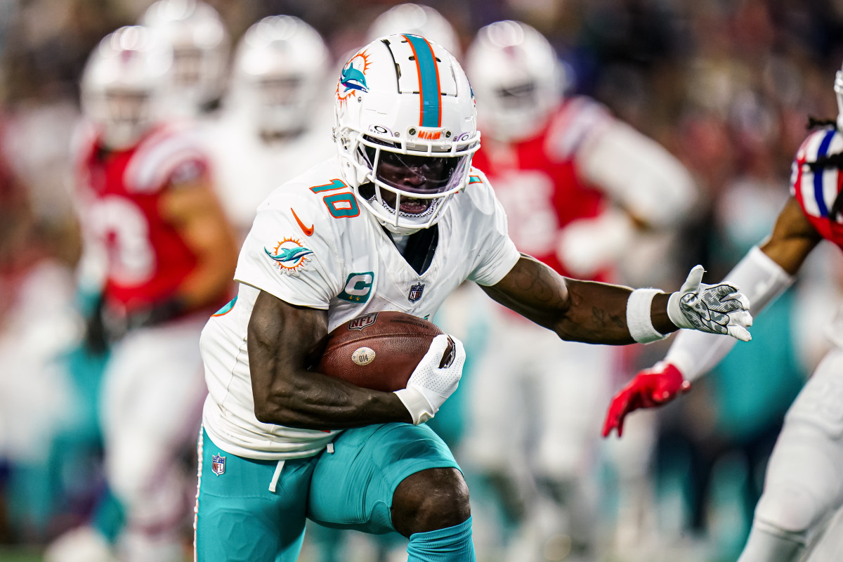 49ers dolphins spread