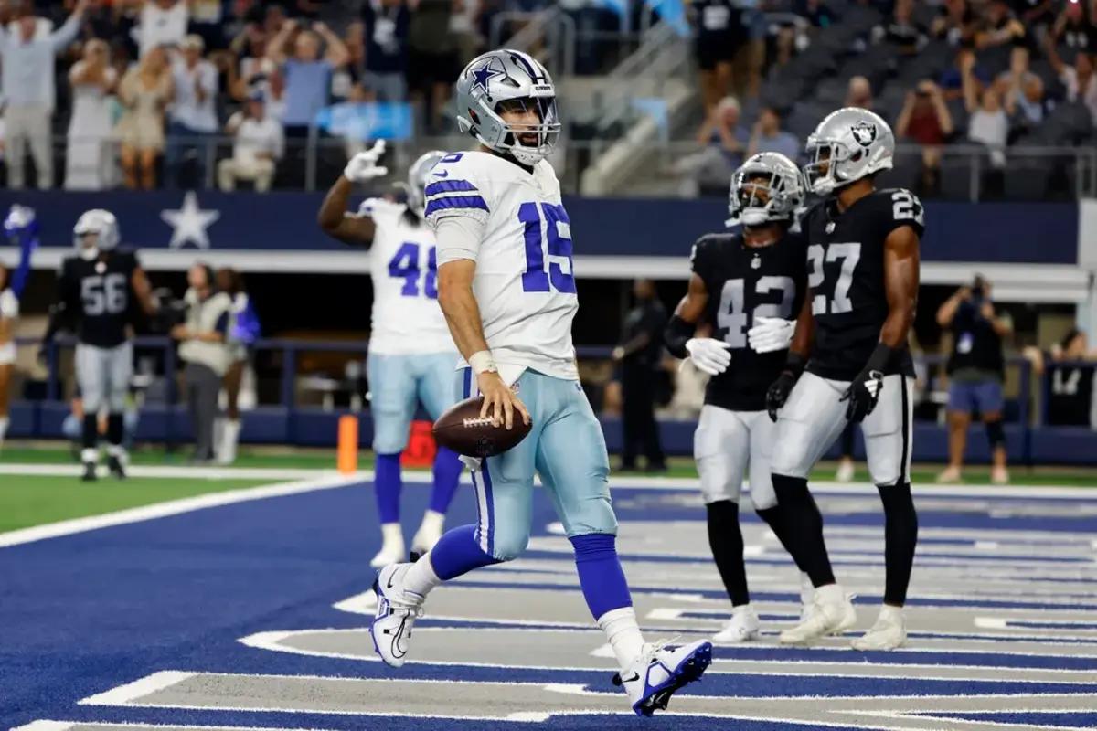 Grier scores a touchdown with the Dallas Cowboys in a preseason game against the Raiders.