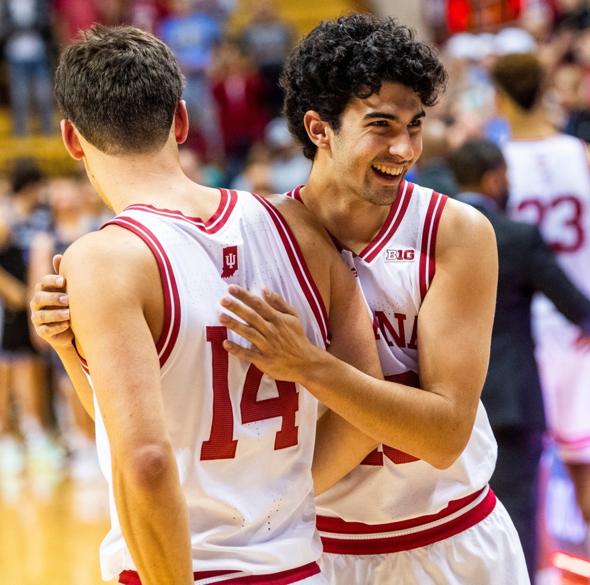Indiana's Nathan Childress (14) and Shaan Burke (13) enjoy the victory after the Indiana versus St. Francis men's basketball game at Simon Skjodt Assembly Hall on Thursday, Nov. 3, 2022.
