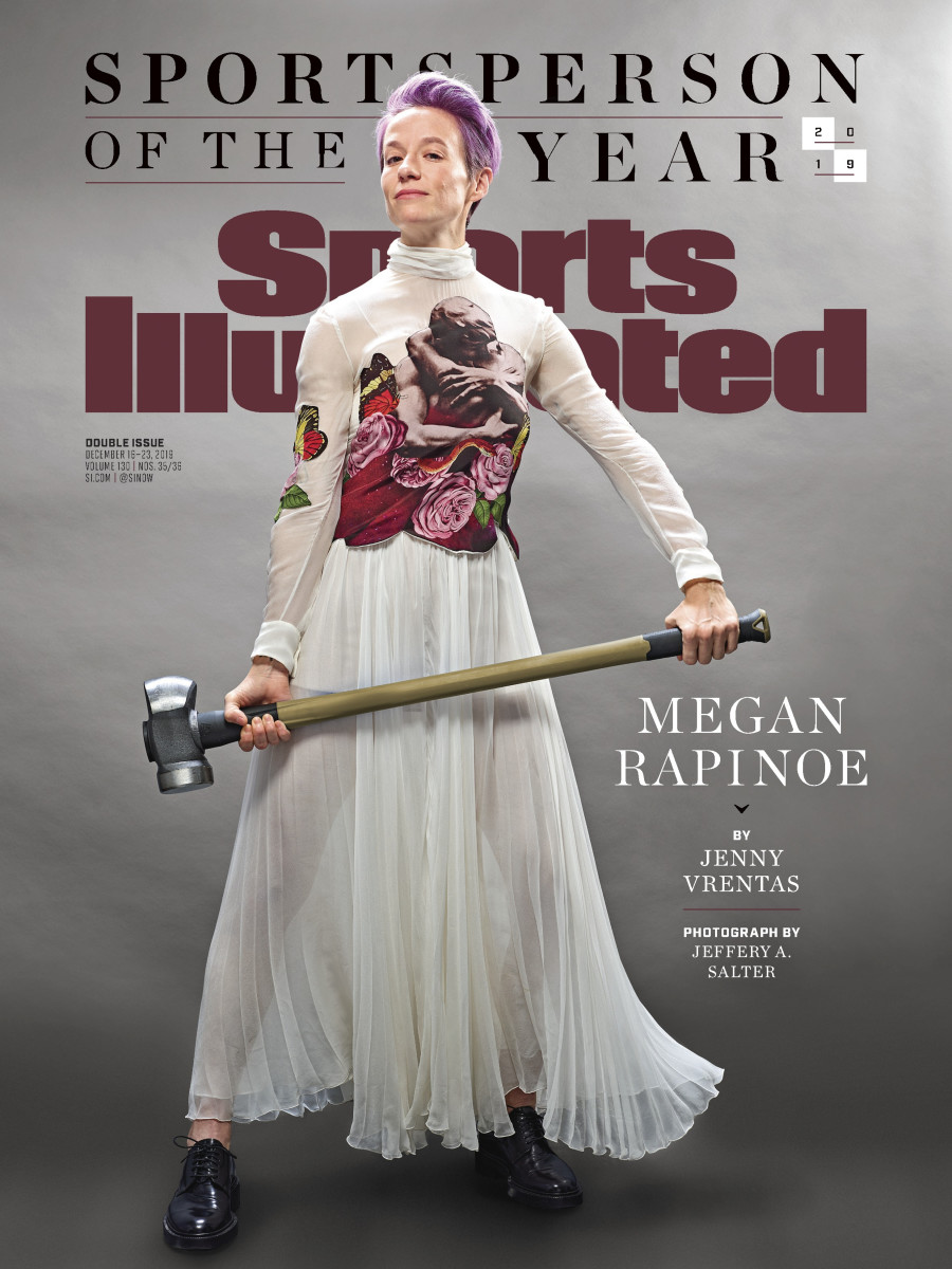 Sports Illustrated Cover: A portrait of US Women's National Team and Reign FC forward Megan Rapinoe posing with a sledge hammer as SI's Sportsperson of the Year in 2019.