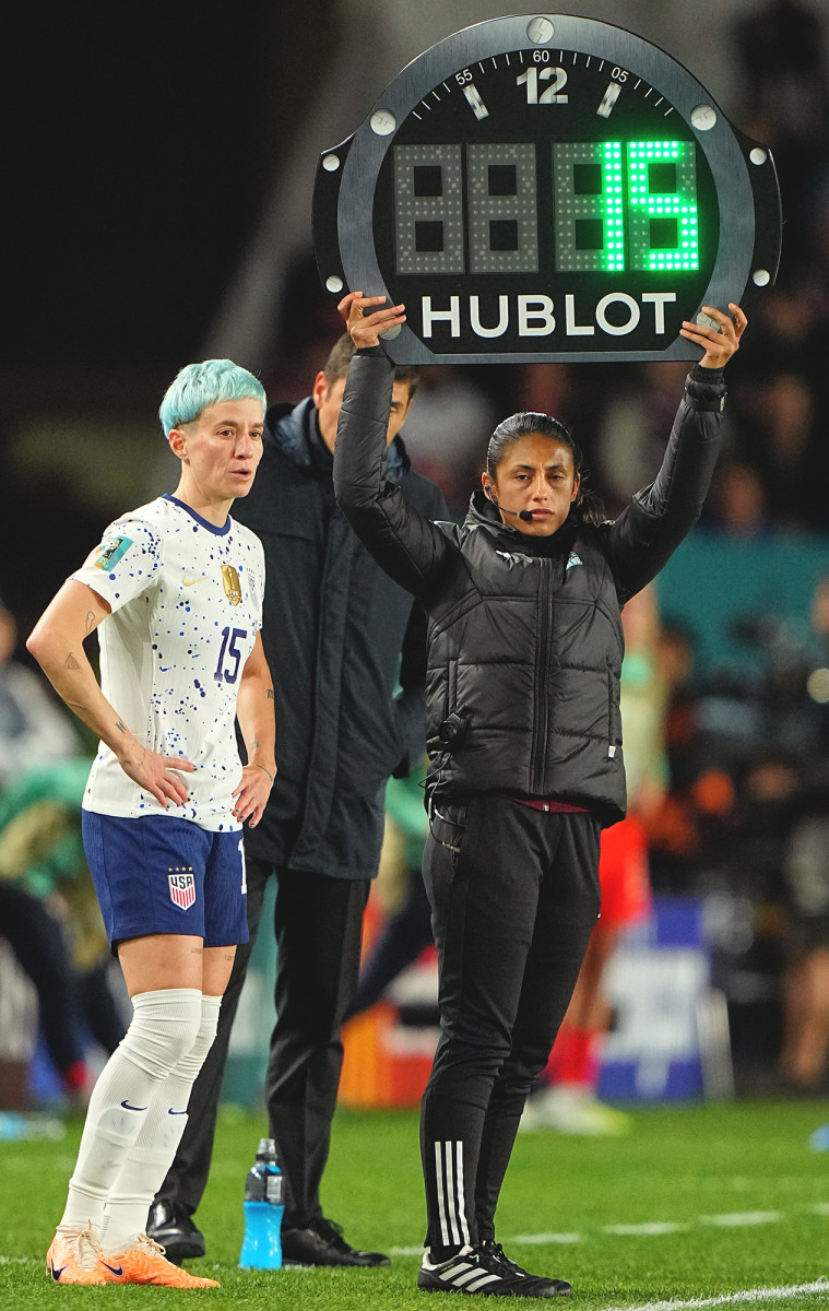 Megan Rapinoe waits to be subbed in during the 2023 Women's World Cup.