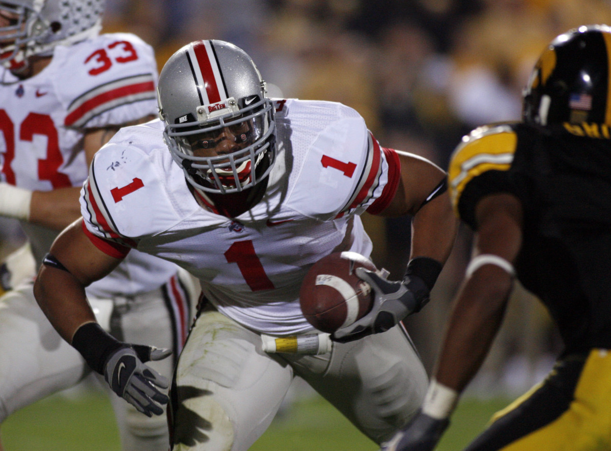 Ohio State linebacker Marcus Freeman (1) returns an interception during a game against the Iowa Hawkeyes on September 30, 2006.