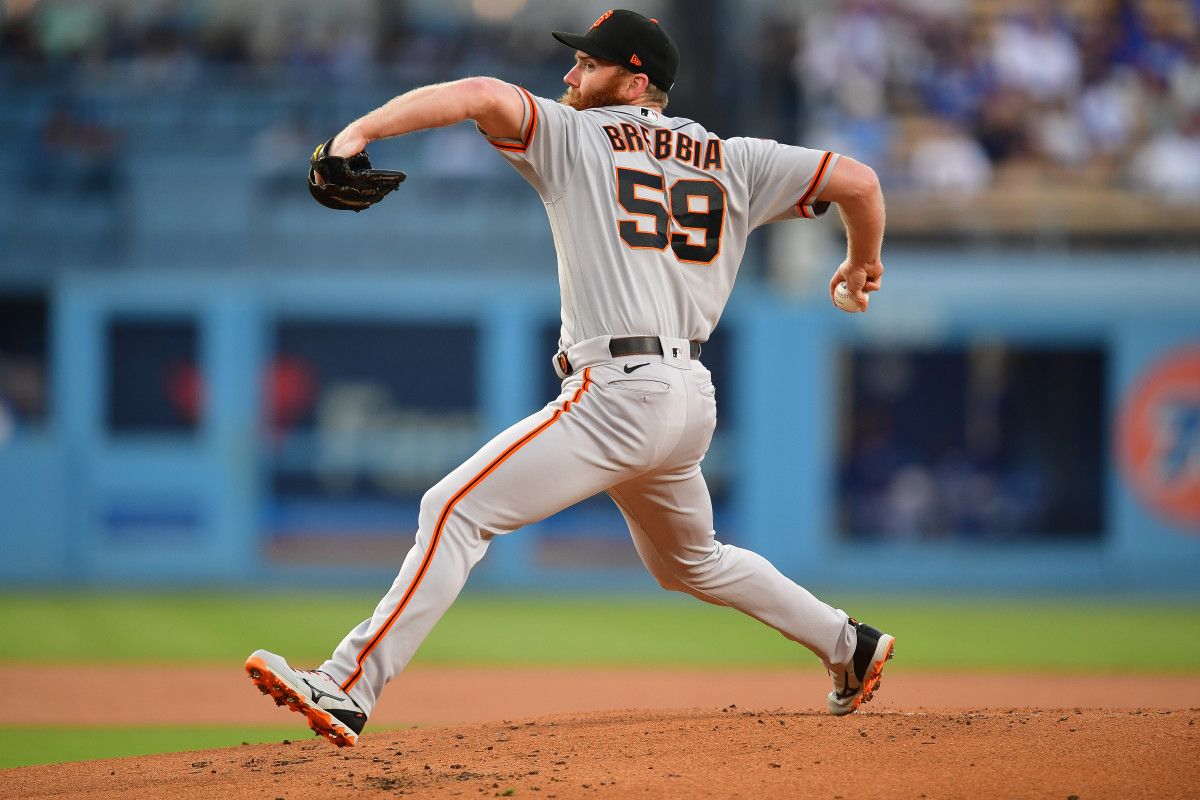 SF Giants relief pitcher John Brebbia throws against the Los Angeles Dodgers during the first inning at Dodger Stadium on September 23, 2023.