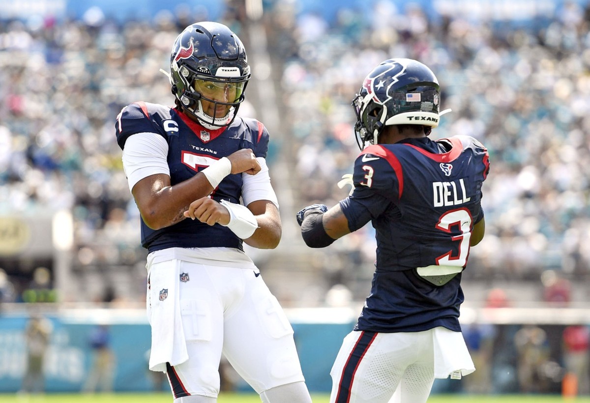 Texans quarterback C.J. Stroud celebrates with Tank Dell after scoring a touchdown against the Jaguars in Week 3.