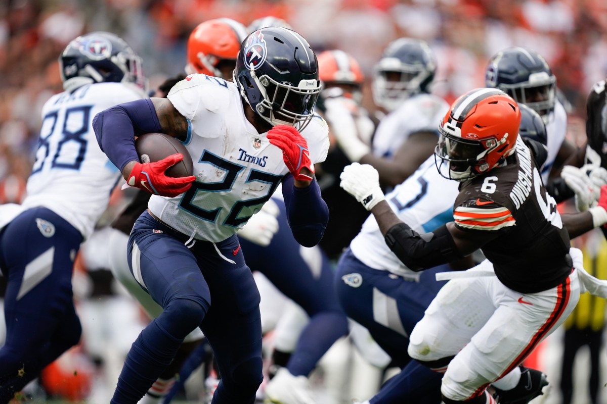 Tennessee Titans running back Derrick Henry (22) runs the ball during the third quarter against the Cleveland Browns.