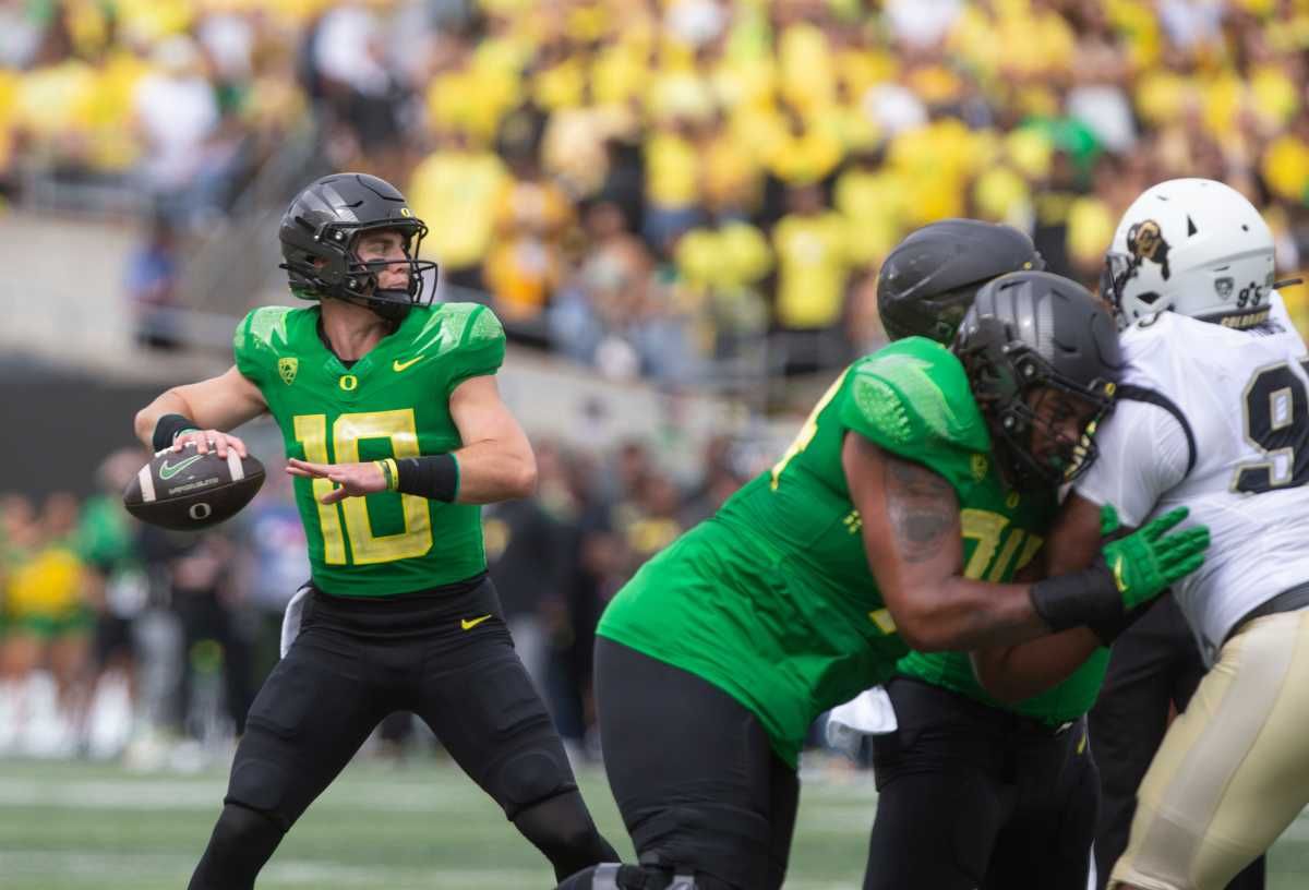 Oregon quarterback Bo Nix drops back to pass during the first quarter against Colorado in Eugene Saturday, Sept. 23, 2023.