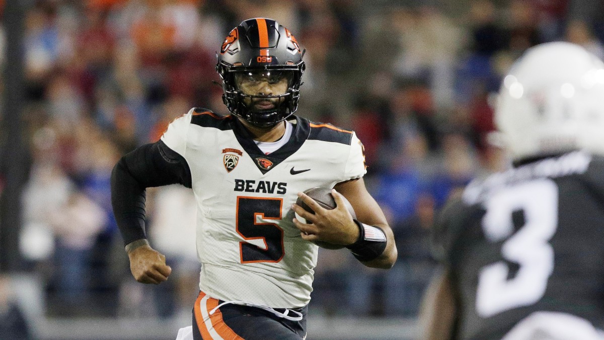 Oregon State quarterback DJ Uiagalelei runs against Washington State.