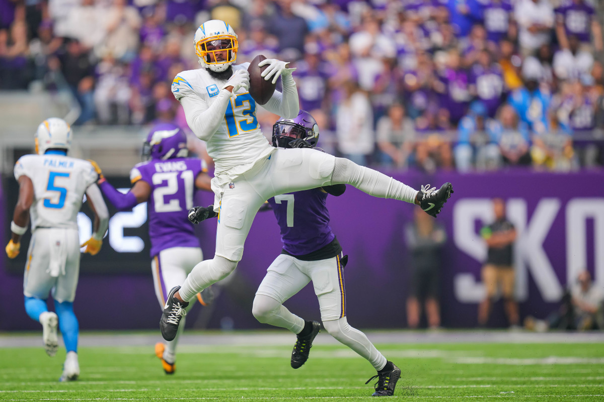 Keenan Allen jumps in the air to catch a pass