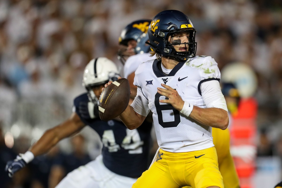 Sep 2, 2023; University Park, Pennsylvania, USA; West Virginia Mountaineers quarterback Garrett Greene (6) looks to throw a pass during the fourth quarter against the Penn State Nittany Lions at Beaver Stadium. Penn State defeated West Virginia 38-15.