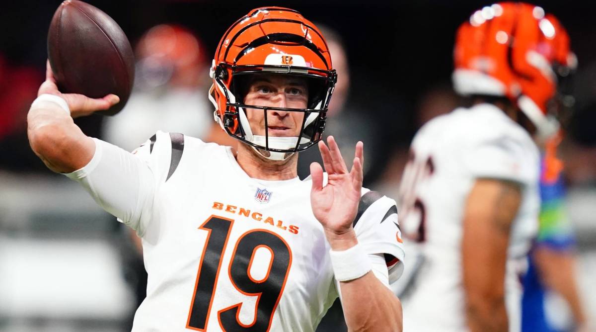 Bengals quarterback Trevor Siemian throws a pass before a game.