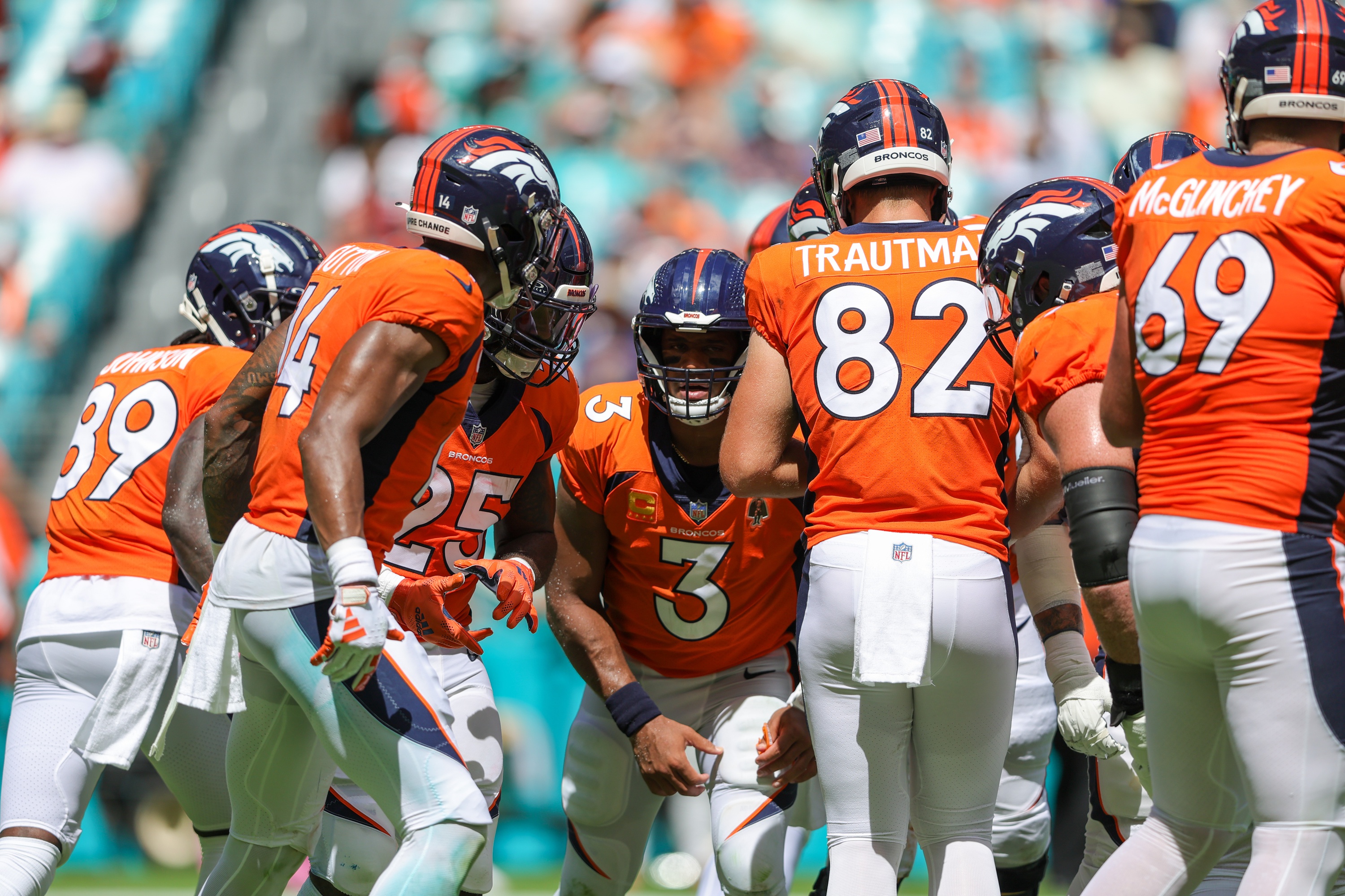 Sep 24, 2023; Miami Gardens, Florida, USA; Denver Broncos quarterback Russell Wilson (3) leads a huddle against the Miami Dolphins in the second quarter at Hard Rock Stadium.