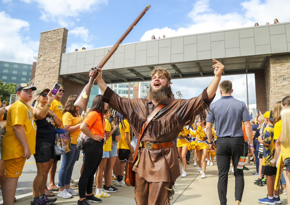 Sep 9, 2023; Morgantown, West Virginia, USA; The West Virginia Mountaineers mascot leads the Mantrip as players arrive before their game against the Duquesne Dukes at Mountaineer Field at Milan Puskar Stadium. Mandatory Credit: Ben Queen-USA TODAY Sports